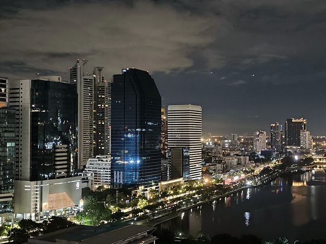 Bangkok river skyline lit up after dark